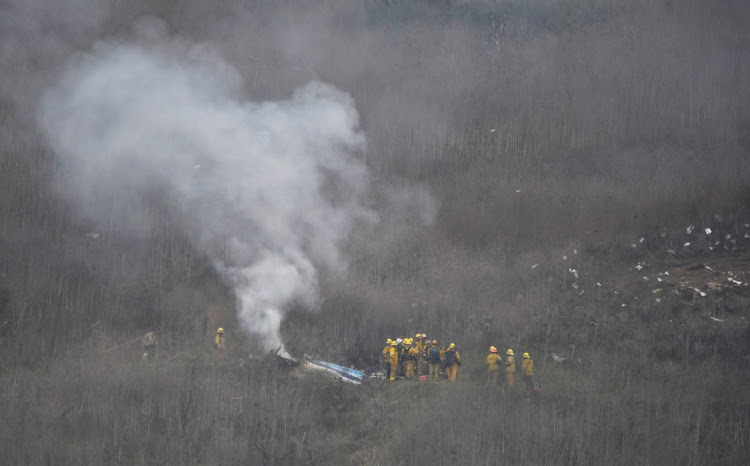 LA county firefighters on the scene of a helicopter crash that reportedly killed Kobe Bryant in Calabasas, California, U.S., January 26, 2020.