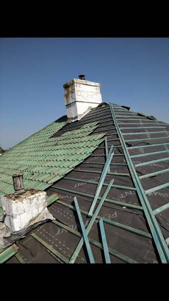 Re roofs using old or new tiles  album cover