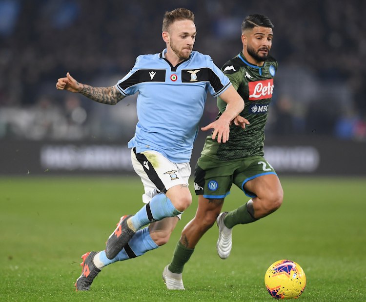 2020 Napoli's Lorenzo Insigne in action with Lazio's Manuel Lazzari REUTERS