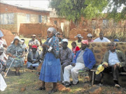 DISILLUSIONED: Residents discuss the way forward after the closure of a local school. PHOTO: BOITUMELO TSHEHLE