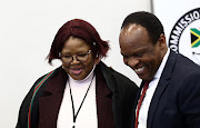 Former ANC MP Vytjie Mentor laughs with Advocate Muzi Sikhakhane at the Zondo commission of inquiry into state capture in Parktown, Johannesburg on August 28 2018.