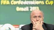 TROUBLED TIMES: Fifa president Sepp Blatter listens to a question during a news conference ahead of the Confederations Cup soccer final match yesterday  between Brazil and Spain in Rio de Janeiro 
      Photo: REUTERS