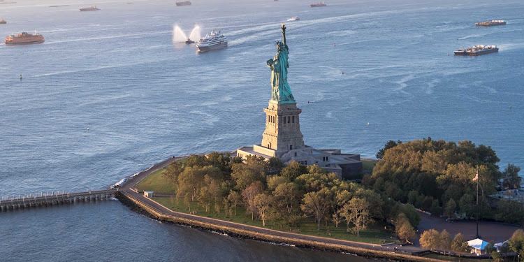 Ponant's Le Boreal sails by Lady Liberty on a visit to New York. 