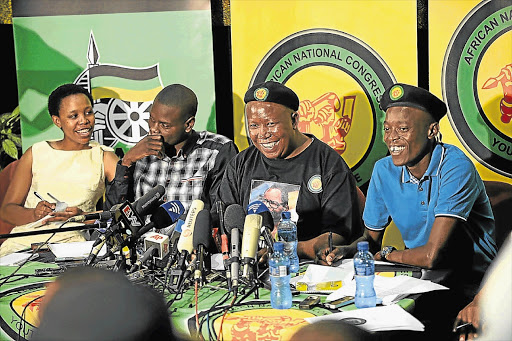 Former ANC Youth League leaders: From left, deputy secretary-general Kenetswe Mosenogi, vice-president Ronald Lamola, president Julius Malema and secretary-general Sindiswa Magaqa, shortly after their suspension