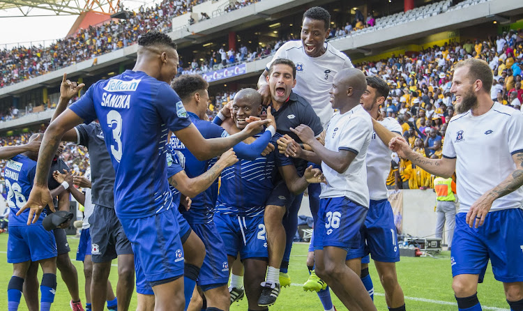 Two-goal hero Judas Moseamedi celebrates with his Maritzburg United teammates after scoring the late winning goal.