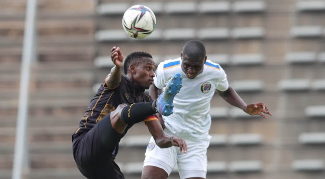 Mxolisi Macuphu of Ryal AM challenged by Thatayaone Ditlhokwe of Supersport United during the Dstv Premiership match at Lucas Moripe Stadium, Pretoria.