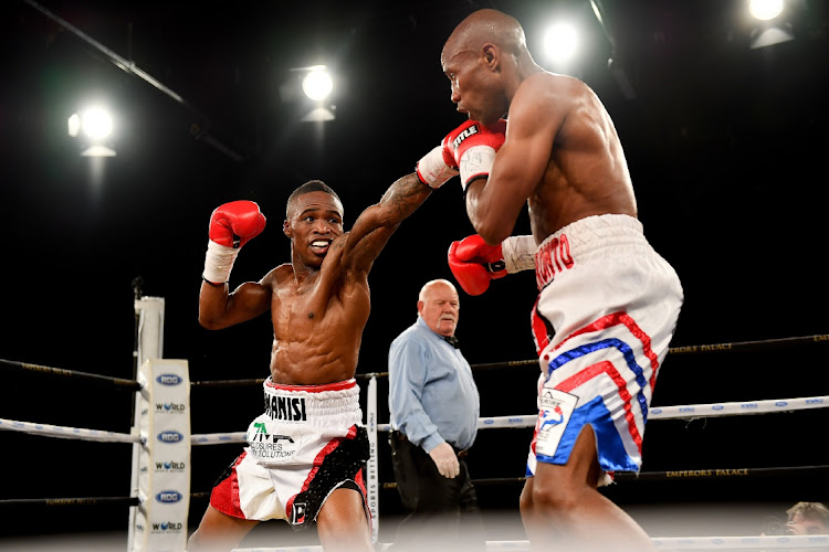 Lusanda Komanisi vs Michael Mokoena during the Call to Glory Boxing event from Emperors Palace.