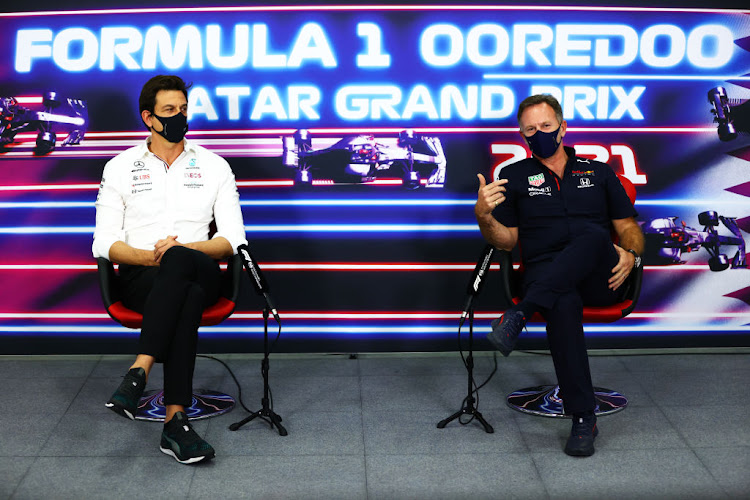 Mercedes GP Executive Director Toto Wolff and Red Bull Racing Team Principal Christian Horner talk in the Team Principals Press Conference during practice ahead of the F1 Grand Prix of Qatar at Losail International Circuit on November 19, 2021 in Doha, Qatar.