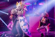 Zikhona Sodlaka performs as the Fox on the Masked Singer.