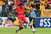 Kaizer Chiefs defender Dillan Solomons tackles Chippa United midfielder Ayabulela Konqobe during their DStv Premiership clash at Buffalo City Stadium.  