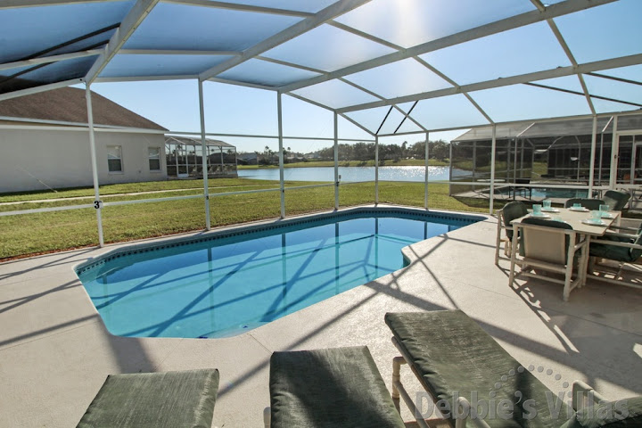 Privately owned vacation villa with a lake view from the pool deck