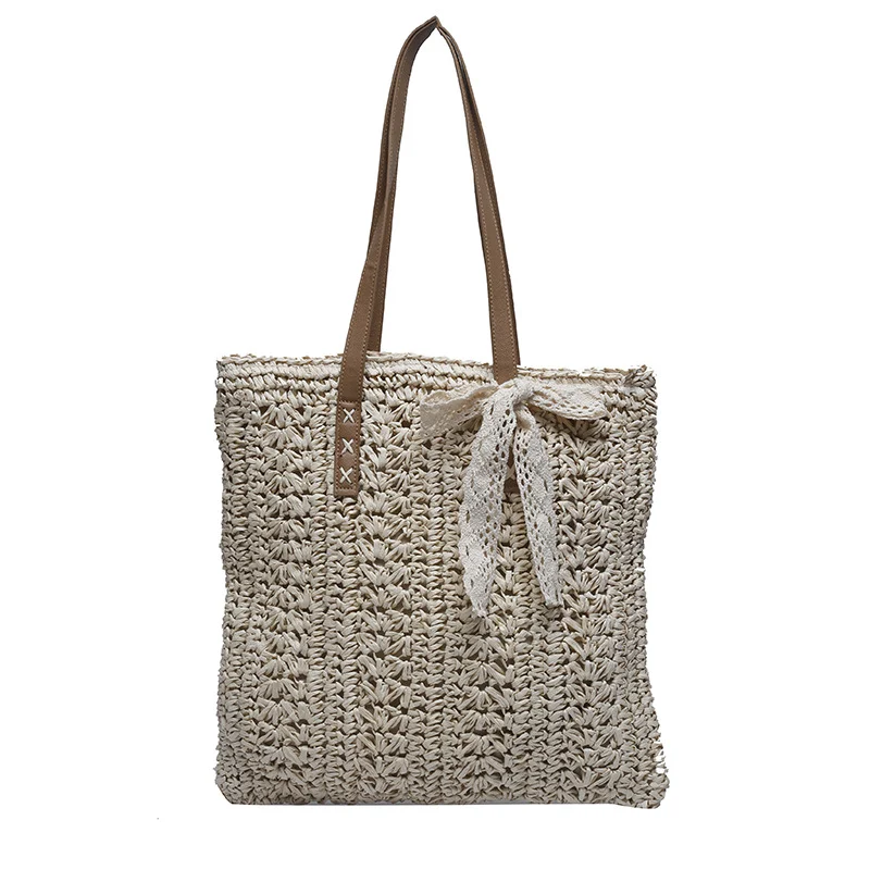 Sac bandoulière d'été en paille tressée, grande capacité, idéal pour la plage. Emportez tout le nécessaire avec style et confort.