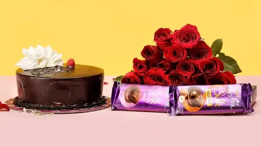 Chocolate Truffle Cake With 10 Red Rose Bunch And 2 Dairy Milk