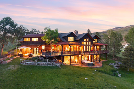 Large wooden house with illuminated exterior in this luxury property for sale in Carbondale ($6,380,000)