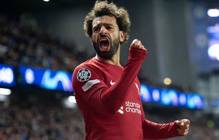 Mohamed Salah of Liverpool celebrates scoring his third goal during the Uefa Champions League Group A match against Rangers at Ibrox Stadium in Glasgow on October 12 2022.