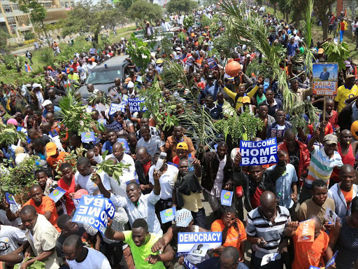 NASA supporters march to receive Raila Odinga after his eight-day tour of the US, November 17, 2017. /DENNIS KAVISU