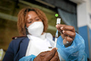 A nurse preparing to vaccinate. 