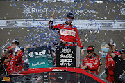 Chase Briscoe, driver of the #14 Mahindra Tractors Ford celebrates in victory lane after winning the the Ruoff Mortgage 500 at Phoenix Raceway on March 13  2022 in Avondale, Arizona.