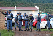 Police at the scene of a shootout in Ngcobo where seven suspects were killed. 