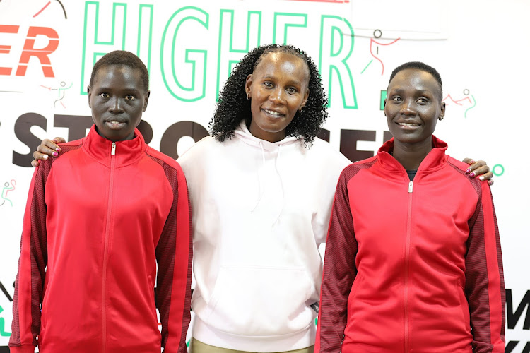 Josephine Tain and Angelina Nadai with 2007 world 800m champion Janeth Jepkosgei