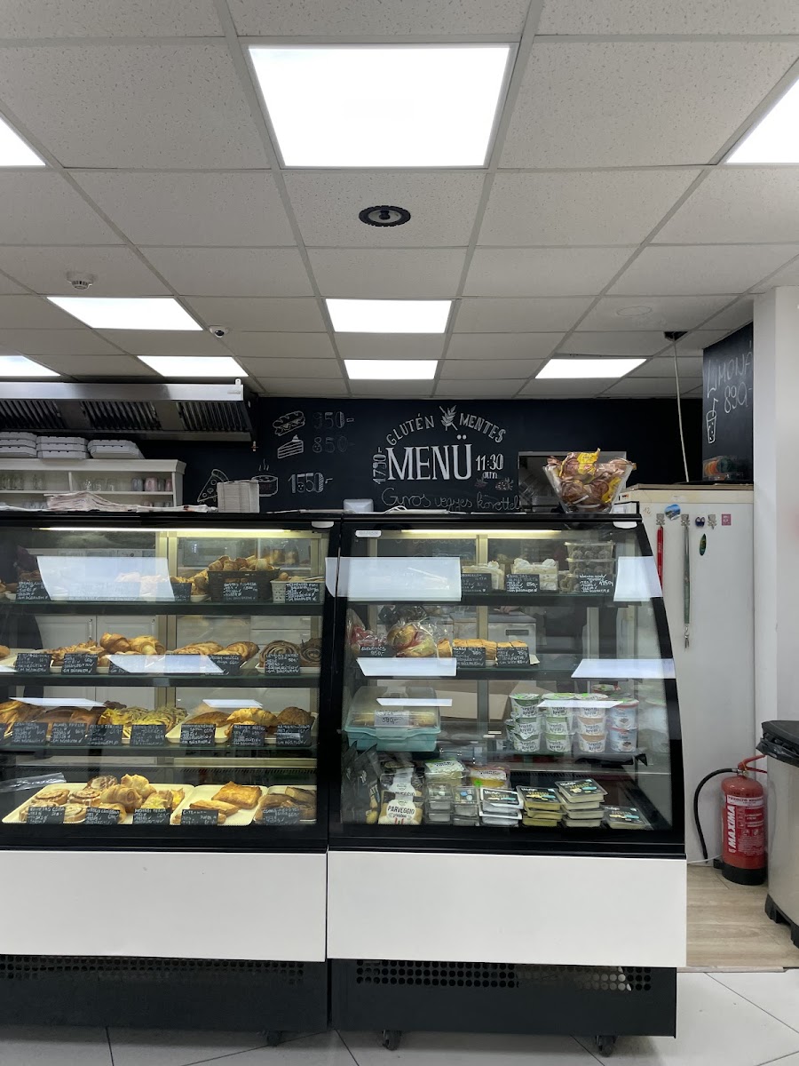 The pastries and cake selection at the counter.