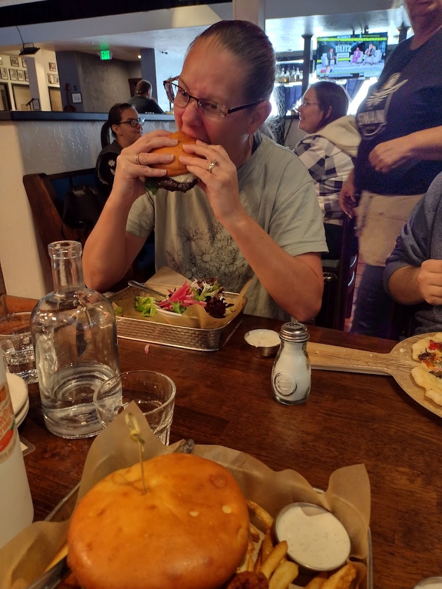 The burger requires a big bite