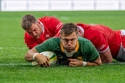 Handre Pollard of the Springboks scores a try during the 3rd Castle Lager Incoming Series test match between South Africa and Wales at DHL Stadium on July 16.
