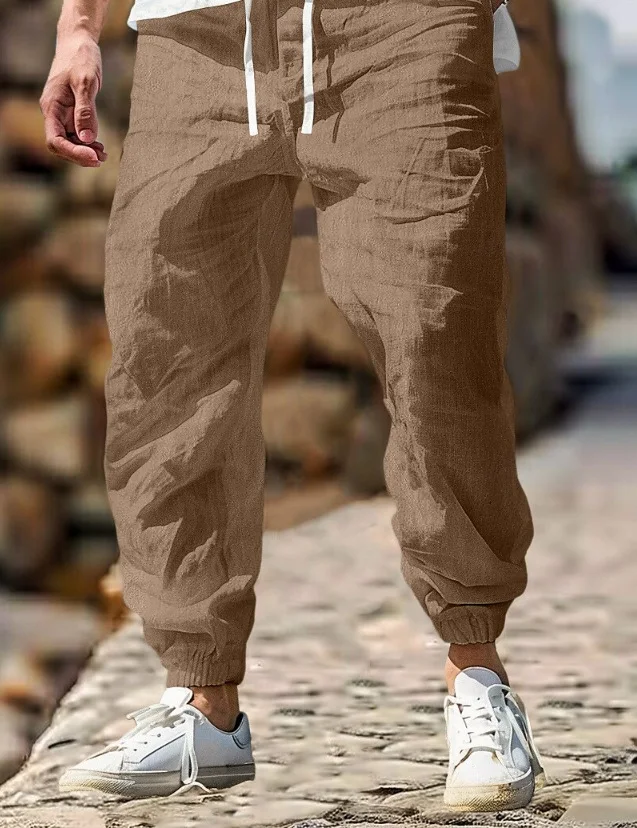 Sommer Leinenhose für Herren mit elastischem Bund, atmungsaktiv und leicht, ideal für heiße Tage. Bequemer Tragekomfort und stilvolles Design für den Sommer.