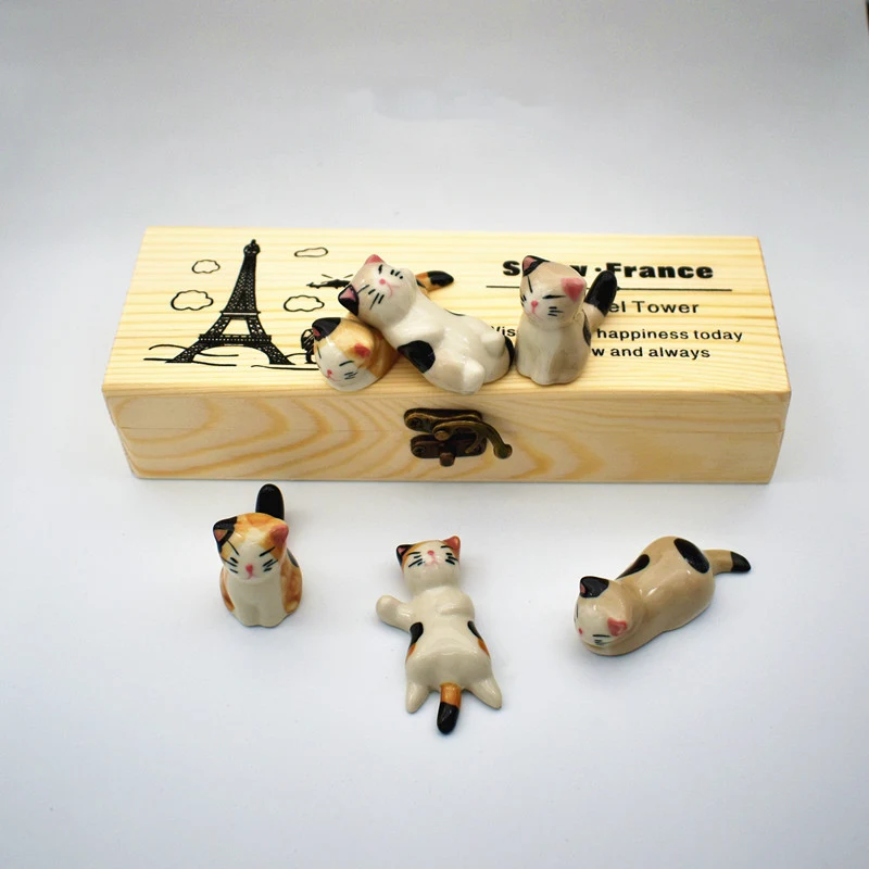 Ceramic Cat Chopstick Holder, Desktop Pen Holder and Craft Decoration. A charming and practical accessory for your desk.