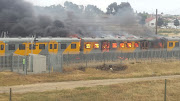 Three train carriages caught fire in Cape Town.