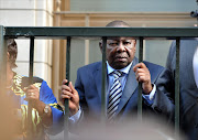 Minister of Higher Education Blade Nzimande addresses students who are protesting outside of parliament on October 21, 2015 in Cape Town, South Africa. Nzimande was briefing student leaders on Thursday 3 December 2015, which was also attended by delegates from the National Student Financial Aid Scheme (NFSAS) and professors, held at the Southern Sun hotel at OR Tambo International Airport.