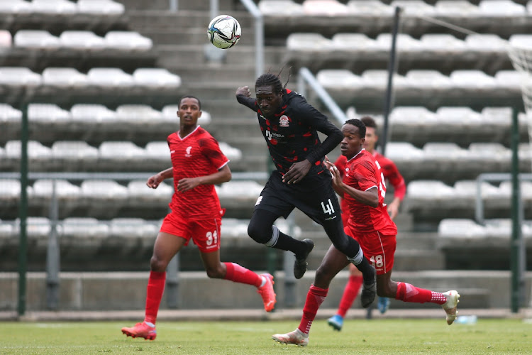 Humphrey Khoza of TS Sporting headers the ball clear during the GladAfrica Championship 2021/22 match between Cape Town Spurs and TS Sporting held at Athlone Stadium in Cape Town.