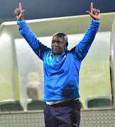 Pitso Mosimane, coach of Mamelodi Sundown celebrates a victory with fans during the Absa Premiership 2016/17 match between Golden Arrows and Mamelodi Sundowns at the Prince Magogo Stadium, South Africa on 28 April 2017.