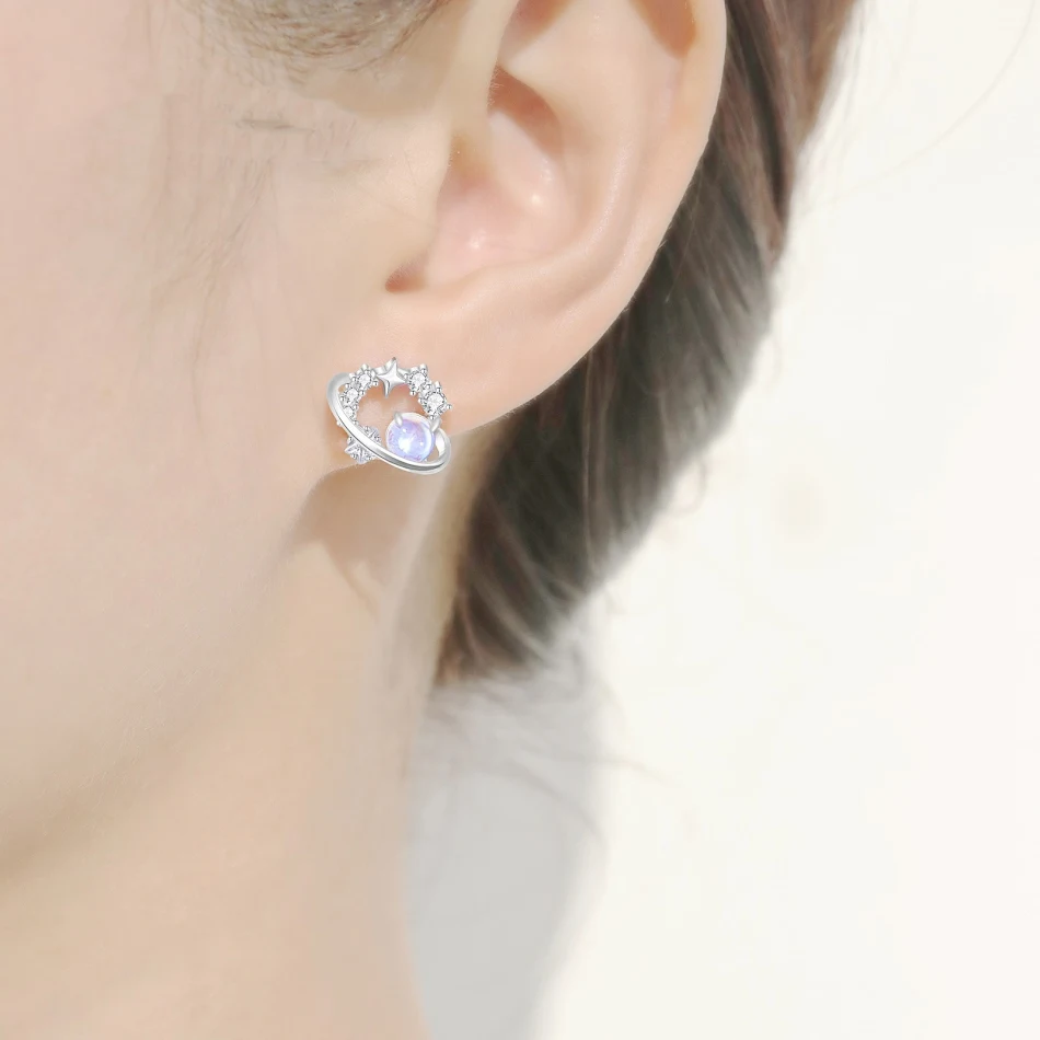 Pendientes Planetarios Diseño Sueño Moonlight Glaze para mujer, elegancia celestial. Un toque único de brillo y estilo para tus orejas.