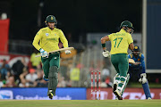 Rassie van der Dussen (L) and Reeza Hendricks (R) of South Africa takes a single during the 2nd KFC T20 International match between South Africa and Sri Lanka at SuperSport Park on March 22, 2019 in Pretoria, South Africa. 