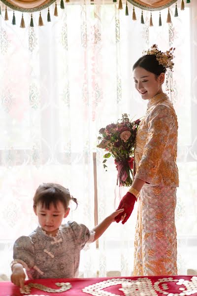 結婚式の写真家Yang Li (zuq60ks)。2022 2月12日の写真