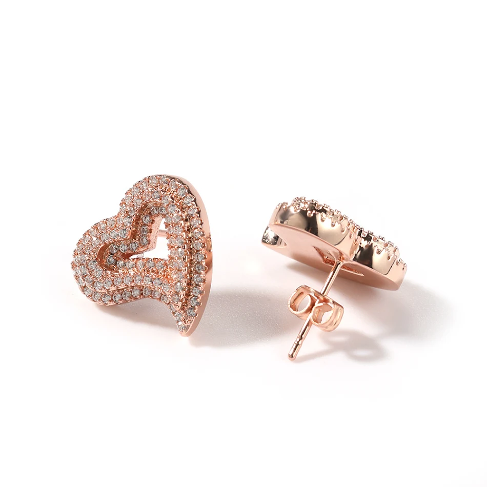 Zircon Hollow Love Heart Stud Earrings Micro-inlaid Retro. A beautiful piece of jewelry perfect for everyday wear or a s