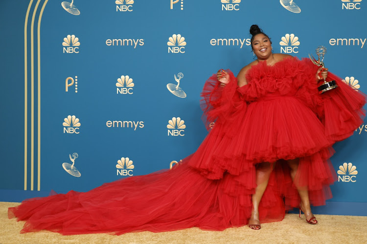 Lizzo, winner of the Outstanding Competition Program award for ‘Lizzo's Watch Out for the Big Grrrls,’ poses in the press room during the 74th Primetime Emmys at Microsoft Theater.