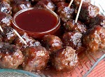 Grape Jelly and Chili Sauce Meatballs was pinched from <a href="http://www.amazingmeatballs.com/recipes/sauce/meatballs-with-grape-jelly-and-chili-sauce.htm" target="_blank">www.amazingmeatballs.com.</a>