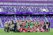 Players of Atletico Madrid celebrates the championship during the La Liga Santander match between Real Valladolid v Atletico Madrid at the Estadio Nuevo Jose Zorrilla on May 22, 2021 in Valladolid Spain 