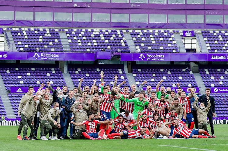 Players of Atletico Madrid celebrates the championship during the La Liga Santander match between Real Valladolid v Atletico Madrid at the Estadio Nuevo Jose Zorrilla on May 22, 2021 in Valladolid Spain