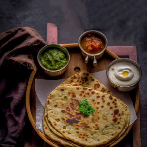 Aloo Pyaz Paratha (1Pc + Curd + Pickle)