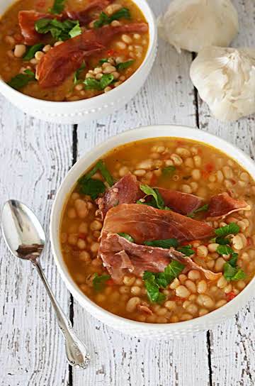 Roasted Garlic and White Bean Soup with Crispy Prosciutto