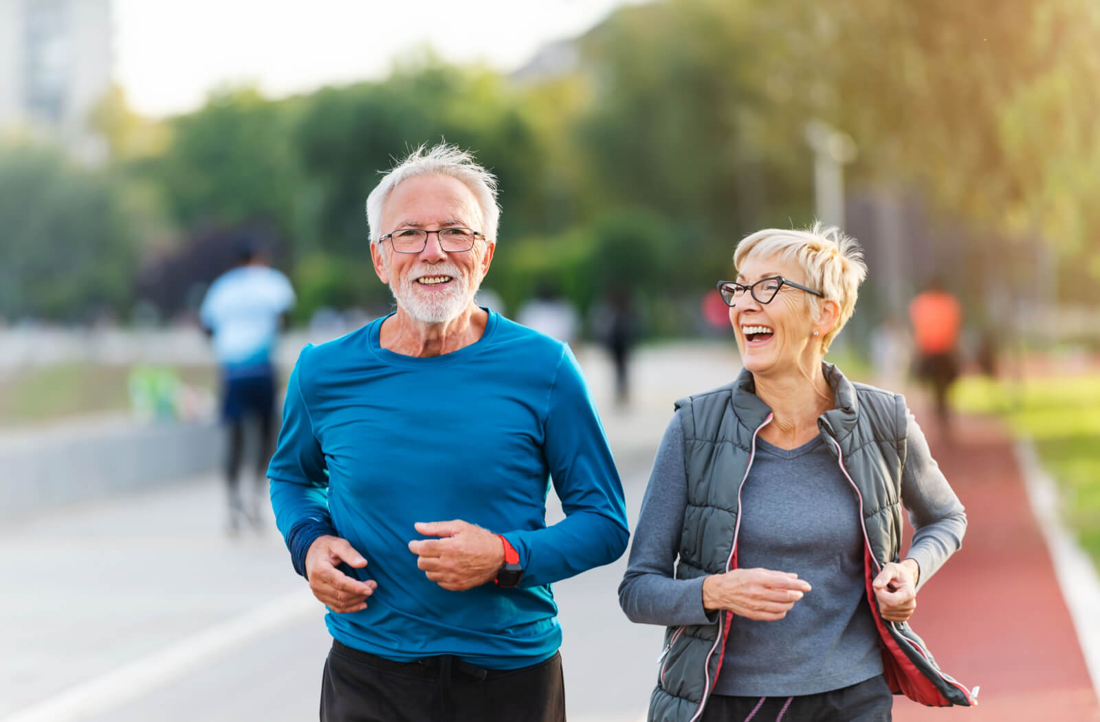 A senior couple having their morning jog as part of their brain training.