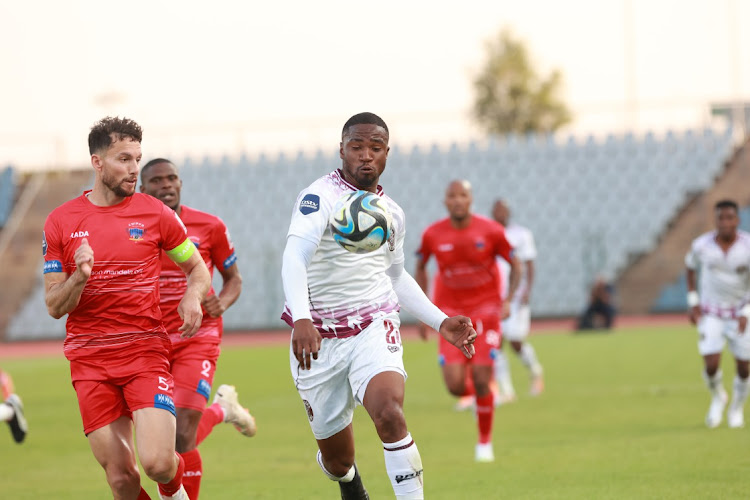 Kagiso Malinga of Moroka Swallows and Roscoe Petersen of Chippa during the DStv Premiership match between Moroka Swallows and Chippa United at Dobsonville Stadium, Soweto