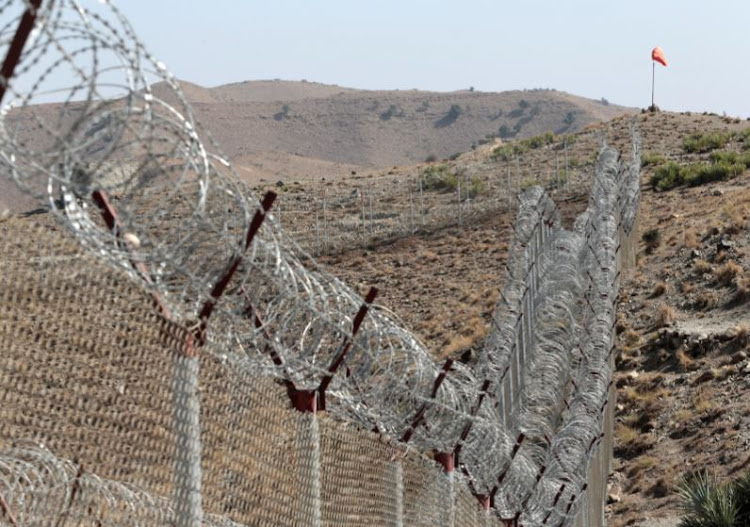 A view of the border fence outside the Kitton outpost on the border with Afghanistan in North Waziristan, Pakistan October 18, 2017.