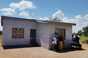 MEC Lena Miga visited Lebotlwane and Pheding villages in Moretele to assess damage caused by heavy rain. Twenty houses were destroyed. The Kgwadi family received a newly built home with the help of a businessman.