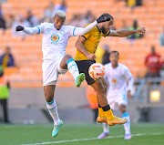 Khanyisa Mayo of Cape Town City and Reeve Frosler of Kaizer Chiefs during the DStv Premiership match at FNB Stadium May 20 2023.