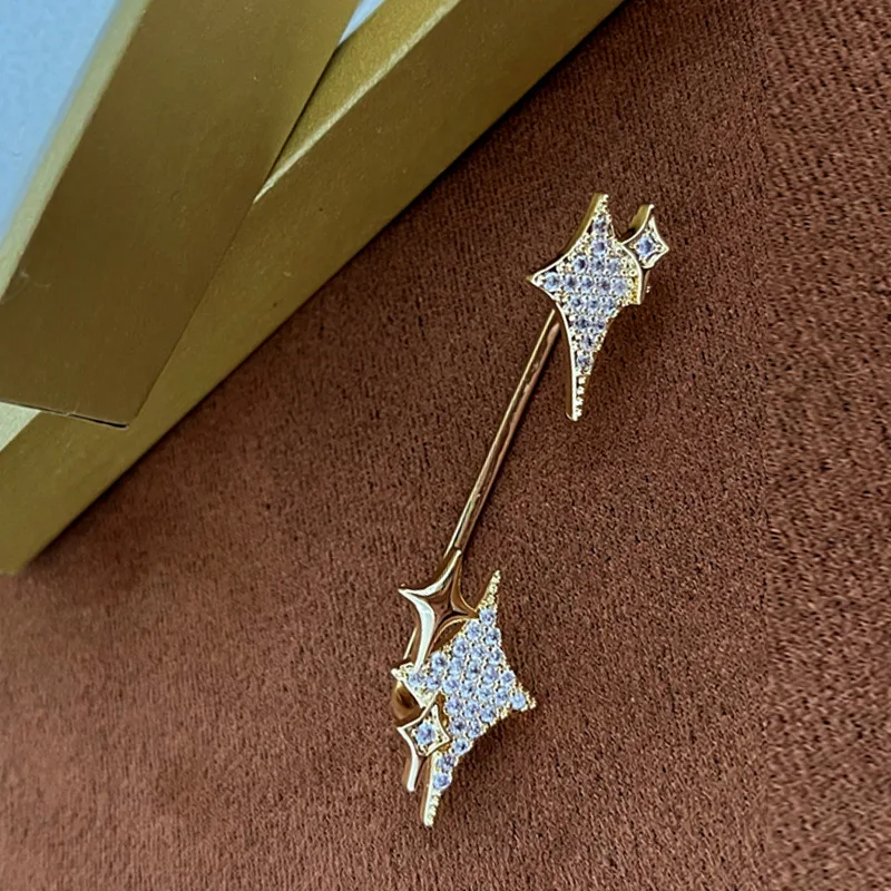 Clip d'oreille étoile sans perçage, mode luxe abordable. Brillez avec élégance et confort, sans besoin de percer vos oreilles.
