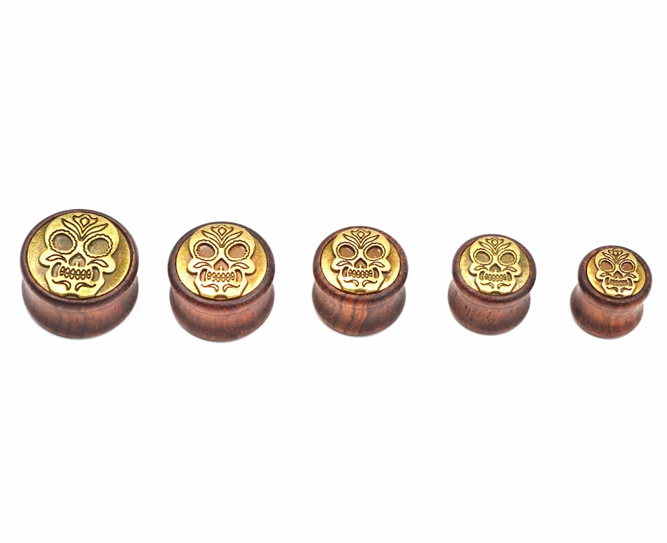 Boucles d'oreilles en feuille de cuivre en forme de crâne d'auricule, un accessoire audacieux et élégant pour affirmer votre style personnel.